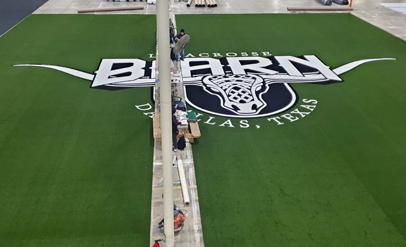 Logo Being Put into Sports Turf | Sports Turf Warehouse